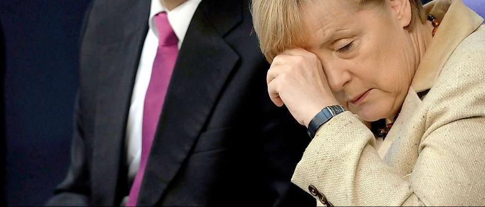 Es war eine Woche der Erschöpfung für Kanzlerin Merkel (CDU) und ihren Vizekanzler Rösler (FDP).