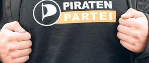 Entschlossen zu bleiben: Auch die Piraten wollen ein Programm. Wirtschaft, Finanzen, Außenpolitik interessieren ihre Mitglieder aber weniger als Transparenz. Foto: Carsten Rehder/dpa