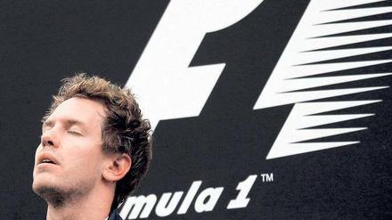 Trauriger Jubel. Sebastian Vettel hatte nach seinem souveränen Erfolg mit gemischten Gefühlen zu kämpfen. Foto: dapd
