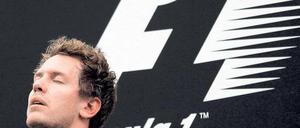 Trauriger Jubel. Sebastian Vettel hatte nach seinem souveränen Erfolg mit gemischten Gefühlen zu kämpfen. Foto: dapd