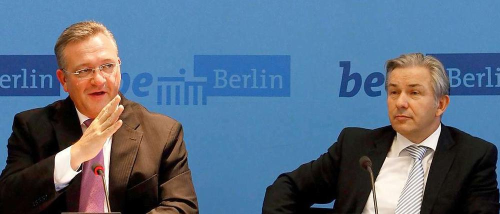 Jetzt rede ich! Frank Henkel (links) und seine CDU wollen in den Verhandlungen mit Klaus Wowereit und der SPD nun Ergebnisse in ihrem Sinne sehen.