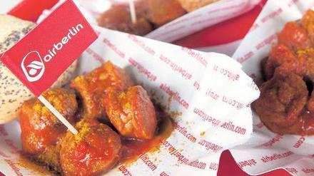 Essen wie zu Hause. Bei einer Feier auf der Flughafenbaustelle Ende Oktober demonstrierte Air Berlin Lokalpatriotismus und reichte Currywurst. 