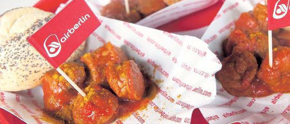 Essen wie zu Hause. Bei einer Feier auf der Flughafenbaustelle Ende Oktober demonstrierte Air Berlin Lokalpatriotismus und reichte Currywurst. 