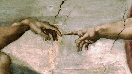 Detail  aus dem Gemälde „Die Erschaffung Adams“ von Michelangelo Buonarrot aus dem Jahr 1512 