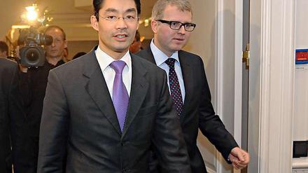 Kontrahenten: FDP-Chef Philipp Rösler und Euro-Rebell Frank schäffler.