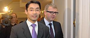 Kontrahenten: FDP-Chef Philipp Rösler und Euro-Rebell Frank schäffler.