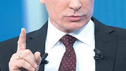 Nicht doch! Die Proteste gegen das Wahlergebnis seien „nichts Außergewöhnliches“, sagte Wladimir Putin in seiner Fernsehansprache. Foto: Alexey Nikolsky/dpa