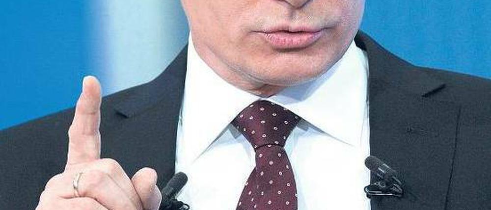 Nicht doch! Die Proteste gegen das Wahlergebnis seien „nichts Außergewöhnliches“, sagte Wladimir Putin in seiner Fernsehansprache. Foto: Alexey Nikolsky/dpa