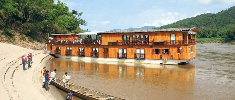 Fernreisen stehen bei Urlaubern hoch im Kurs und sind für die Veranstalter durchaus einträglich. Etwa eine Kreuzfahrt auf dem mittleren Lauf des Mekong durch Laos.