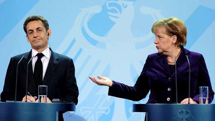 Nicolas Sarkozy und Angela Merkel