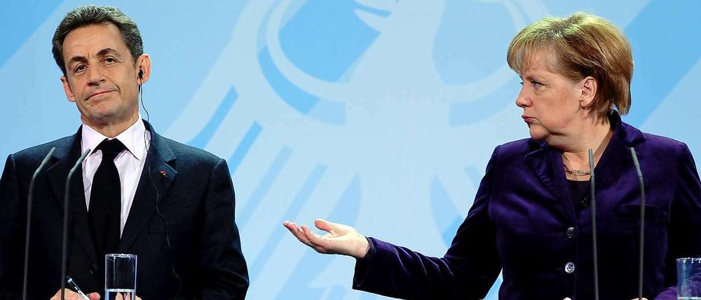 Nicolas Sarkozy und Angela Merkel