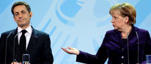 Nicolas Sarkozy und Angela Merkel
