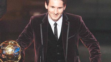 Im Glanze. Messi setzte sich gegen Cristiano Ronaldo und Xavi durch. Foto: Reuters