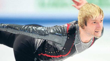 Qualen eines Kunstlaufstars. Jewgeni Pluschenko sah nach seiner Qualifikation für das finale EM -Turnier fix und fertig aus. Foto: dapd
