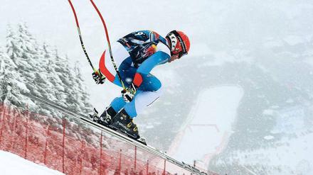 Ab ins Tal. Didier Cuche kam mit den Bedingungen am besten zurecht. Wegen starken Schneefalls war die Abfahrt um 45 Fahrsekunden verkürzt worden. 