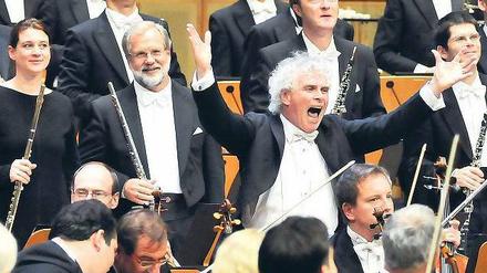Kostenpflichtig. Simon Rattle und die Berliner Philharmoniker. Foto: dpa