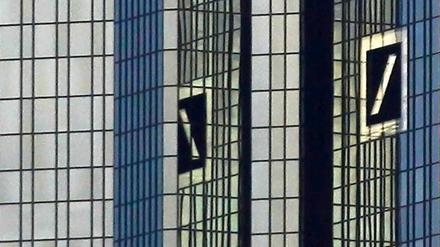 Wegen der Schuldenkrise macht die Deutsche Bank Verluste.