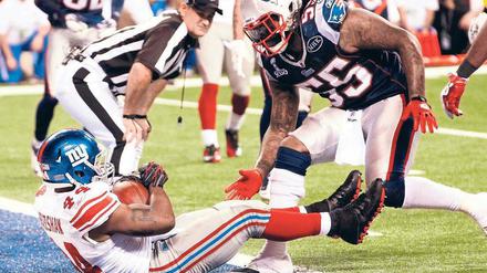 Zum Titel spaziert. New Yorks Ahmad Bradshaw hatte bei seinem entscheidenden Touchdown wenig Gegenwehr. Foto: Reuters