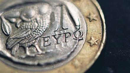 Feilschen um den Euro. Mit der Hilfe eines Sonderkontos sollen die Forderungen der Griechenland-Gläubiger abgegolten werden.