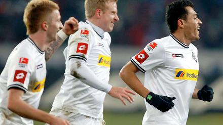 Marco Reus (l.) erzielte das Tor zum 1:0, Mike Hanke (m.) und Juan Arango steuerten die weiteren beiden Treffer für die Gladbacher bei.