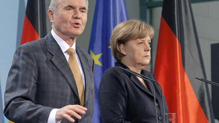 Otmar Issing und Angela Merkel