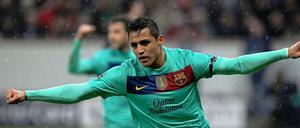 Eiskalt im Rheinländischen Regen: Barcelonas chilenischer Doppeltorschütze Alexis Sanchez.