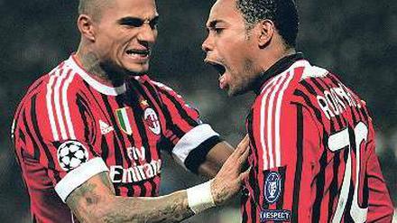 Habe die Ehre! Robinho (rechts) gratuliert Kevin-Prince Boateng . Foto: AFP