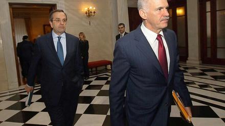 Verpflichten sich zu den Reformen: Giorgos Papandreou (vorn) und Antonis Samaras.