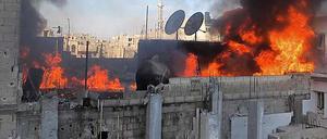 Homs brennt. Schon seit Wochen befindet sich die Rebellenhochburg im Visier des Regimes.