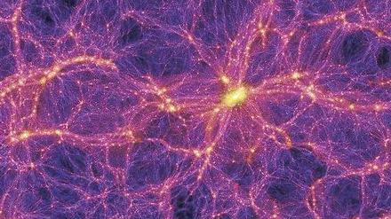 Kosmisches Netz. Die Simulation zeigt mit hellen Farben, dass sich die Dunkle Materie ebenso wie die sichtbare Materie entlang von „Fäden“ und „Knoten“ verteilt.