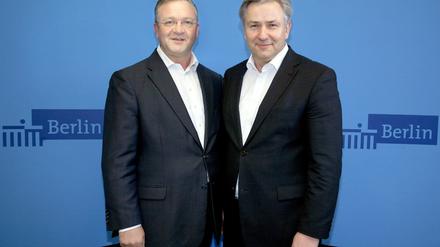 Wie aus einem Guss: Wowereit (rechts) und Henkel bei ihrer Zwischenbilanz.