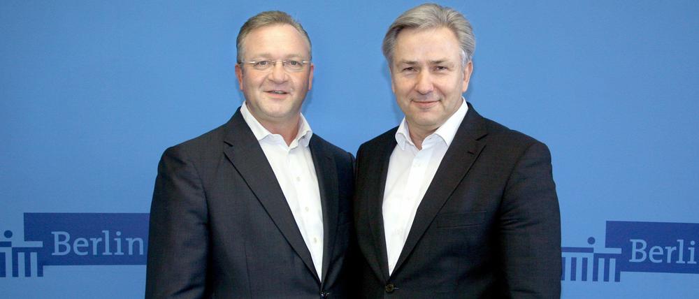 Wie aus einem Guss: Wowereit (rechts) und Henkel bei ihrer Zwischenbilanz.