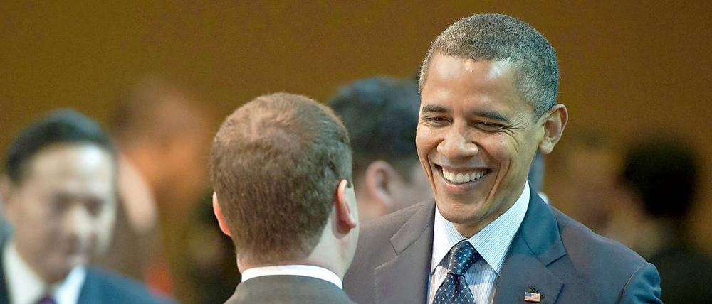 Herzliche Begegnung beim Atomgipfel in Seoul. Nach der Wahl sieht Barack Obama (hinten) mehr Möglichkeiten, russischen Wünschen bei der Raketenabwehr entgegenzukommen.