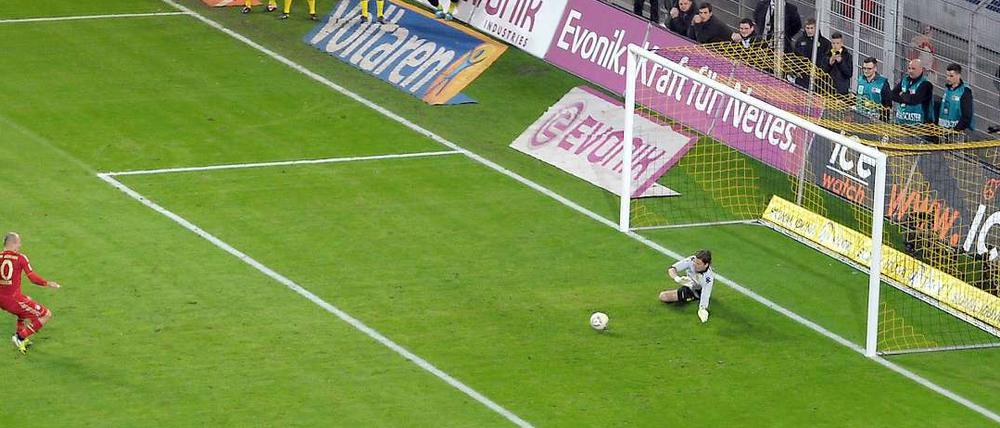 Arjen Robbens Elfmeter-Fehlschuss in Dortmund entschied die Titelkampf vorzeitig zugunsten des BVB.