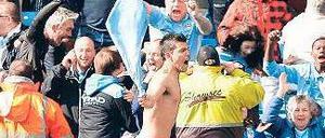 Völlig losgelöst. Sergio Agüero nach seinem Siegtor für Manchester City in der dritten Minute der Nachspielzeit gegen die Queens Park Rangers. Foto: Reuters