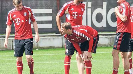 München liegt nicht in Südfrankreich. Toni Kroos, Manuel Neuer, Jerome Boateng und Mario Gomez (von links) reisen erst in ein paar Tagen zur Nationalmannschaft. Foto: AFP