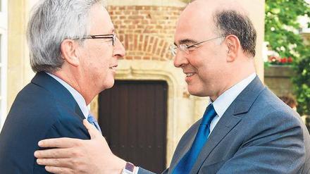 Ziemlich beste Freunde. Frankreichs Finanzminister Pierre Moscovici (rechts) hält große Stücke auf Jean-Claude Juncker. 