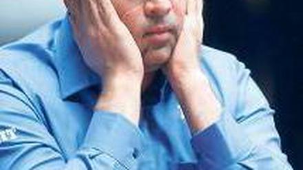 Schwerstarbeit. Viswanathan Anand gewann das WM-Finale im Stechen. Foto: dapd