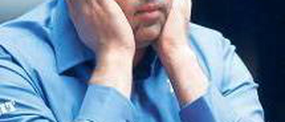 Schwerstarbeit. Viswanathan Anand gewann das WM-Finale im Stechen. Foto: dapd