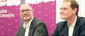 Einer wird gewinnen. Berlins Sozialdemokraten entscheiden am heutigen Sonnabend über den nächsten SPD-Landesvorsitzenden – die Wahl zwischen Jan Stöß (li.) und Michael Müller gilt auch als Votum über die Politik des Regierenden Klaus Wowereits. Foto: dpa/Kahnert