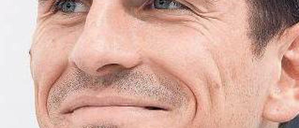 Durchaus fröhlich. Mario Gomez bei der Pressekonefernz der deutschen Mannschaft am Montag.