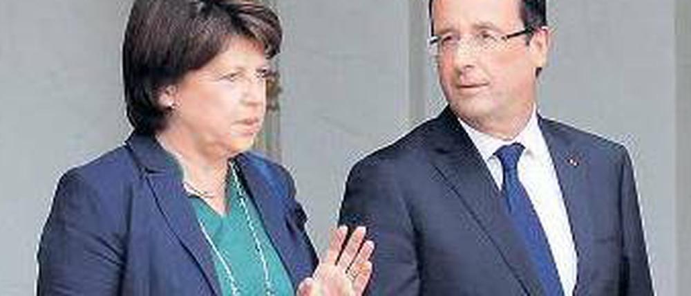 Auf der Siegerstraße. Präsident François Hollande und die Parteichefin der Sozialisten, Martine Aubry.