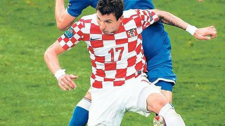 Eckig und kantig. Dank Mario Mandzukic hat Kroatien gute Chancen aufs Weiterkommen. Der Stürmer traf bereits dreimal. Foto: dapd