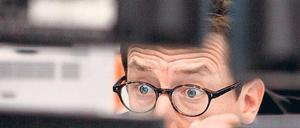 Große Augen. Börsenhändler scheinen von der Einigung überrascht worden zu sein.Foto: dpa