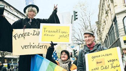 Bunt und erfolgreich. Eine Finanztransaktionssteuer war eine der zentralen Forderungen der Occupy-Bewegung, um die Märkte zu zähmen. Sie könnte jetzt teilweise erfüllt werden. Die Protestwelle der Globalisierungsgegner ist hingegen abgeebbt. Foto: dapd