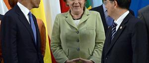 Bundeskanzlerin Angela Merkel zwischen US-Präsident Barack Obama und dem chinesischen Staatspräsidenten Hu Jintao.