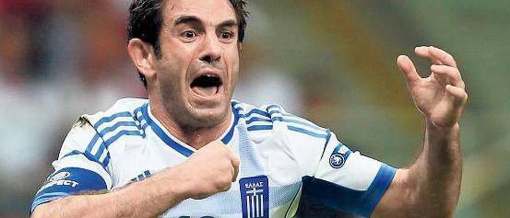 Tragischer Held. Georgios Karagounis, 35, schoss das Siegtor gegen Russland, aber wird das Viertelfinale gelbgesperrt verpassen.