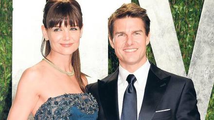Gute Miene. Katie Holmes, die ihren Plan lange vorbereitete, lächelte noch im Februar neben ihrem Mann, als wäre nichts. Foto: dapd