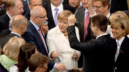Die Kanzlerin kann zufrieden sein. Eine überwältigende Mehrheit der Parlamentarier stimmte für den Fiskalpakt.