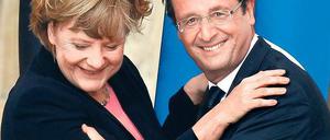 Hollande und Merkel wiederholen vor der Kathedrale von Reims einen historischen Akt.